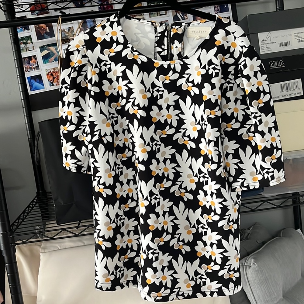 Floral print , back 1/4 zip, top size medium